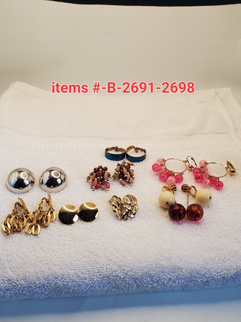 8 Pair of vintage clip on Earring, items #B- 2691-2698, . wt. 105 grams.